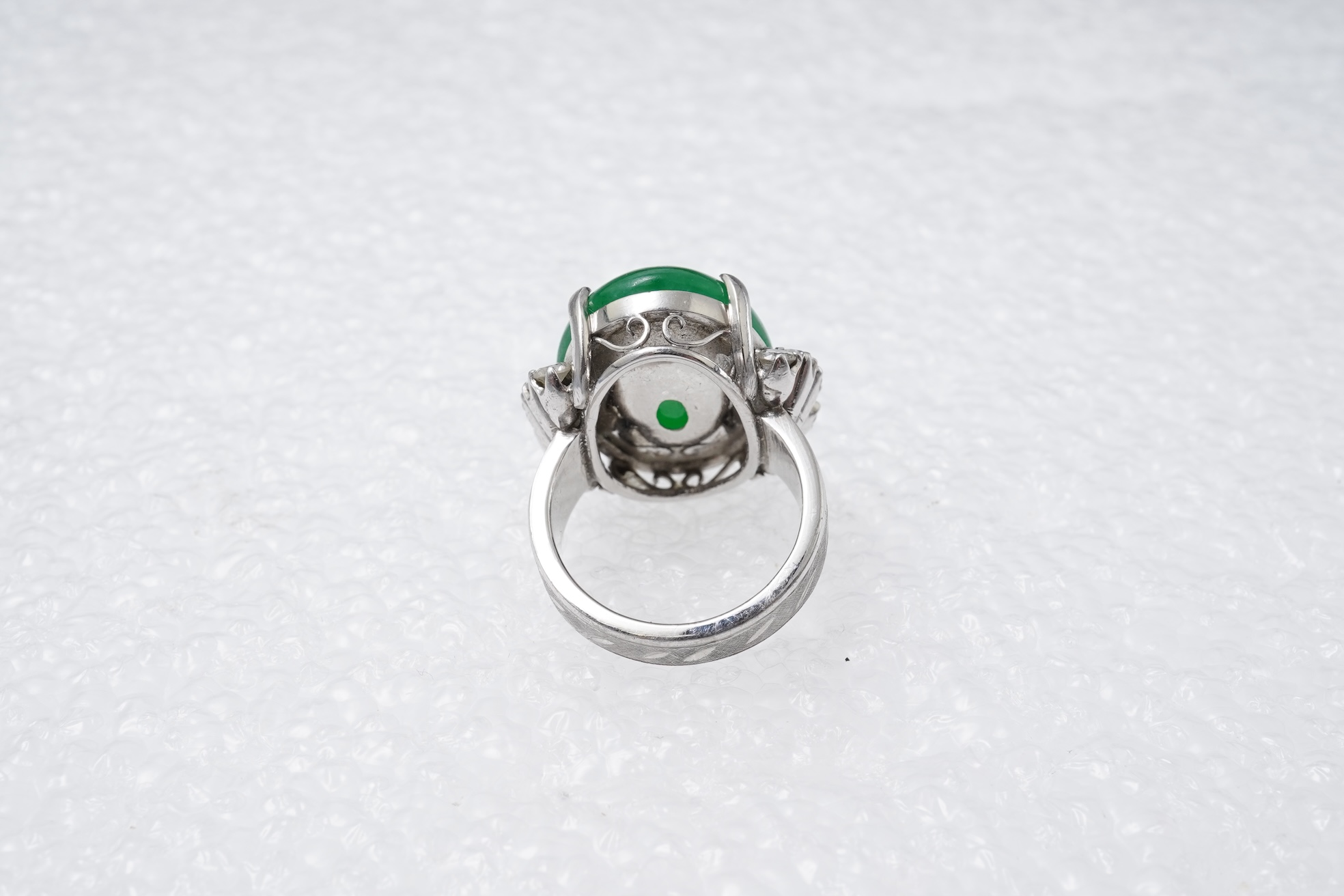 A jadeite and diamond ring, 1960s